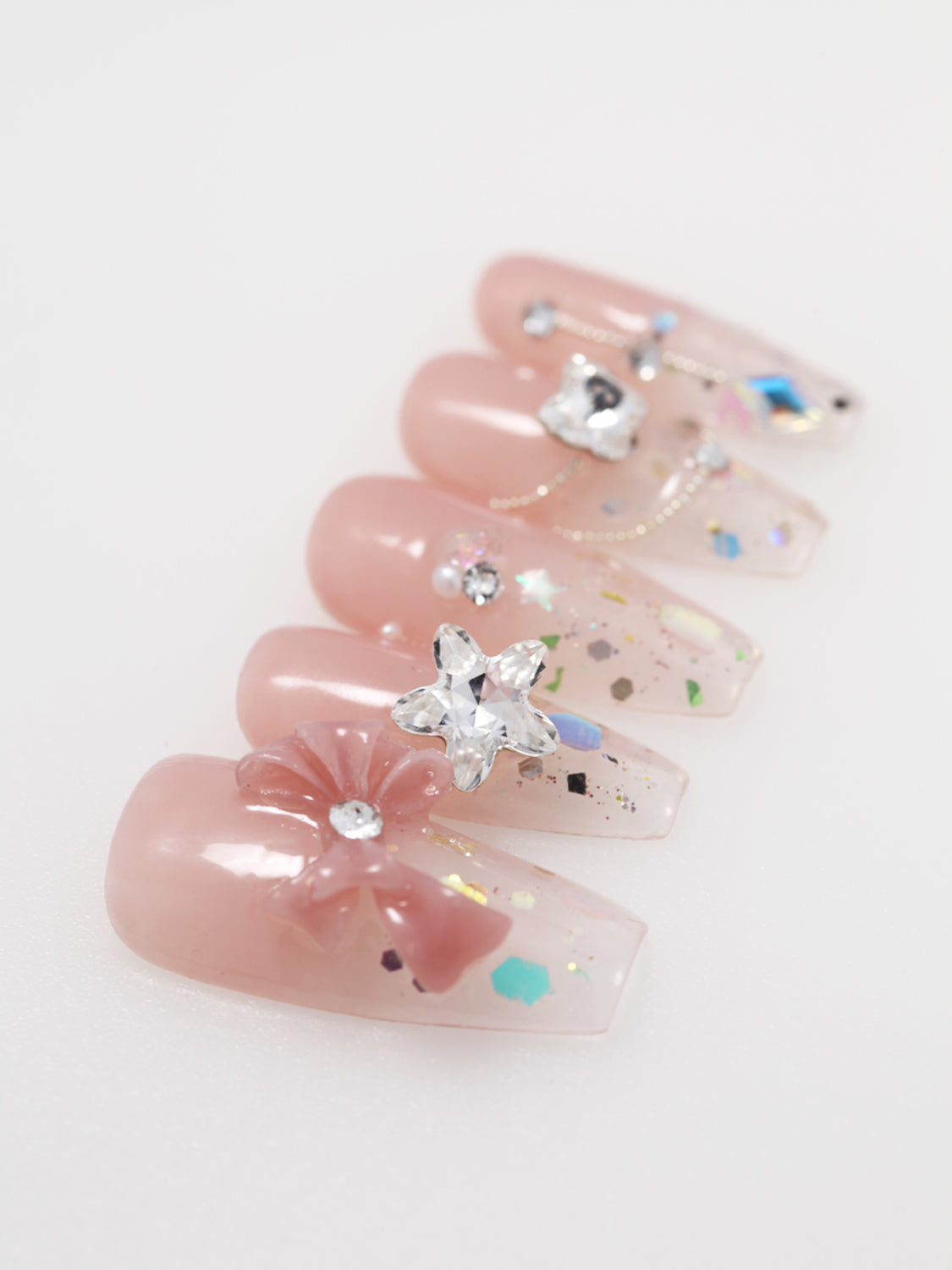 MIEAP summer candy press on nail for a burst of sweet, colorful vibes! This set features a peachy pink to transparent ombre with holographic glitter and handcrafted Swarovski rhinestones. Perfect for your sunny days. #MIEAPnails #pressonnail #acrylicnail #nails #nailart #naildesign #nailinspo #handmadenail #summernail #nail2023 #graduationnail #swarovskinail  #datingnail #promnail