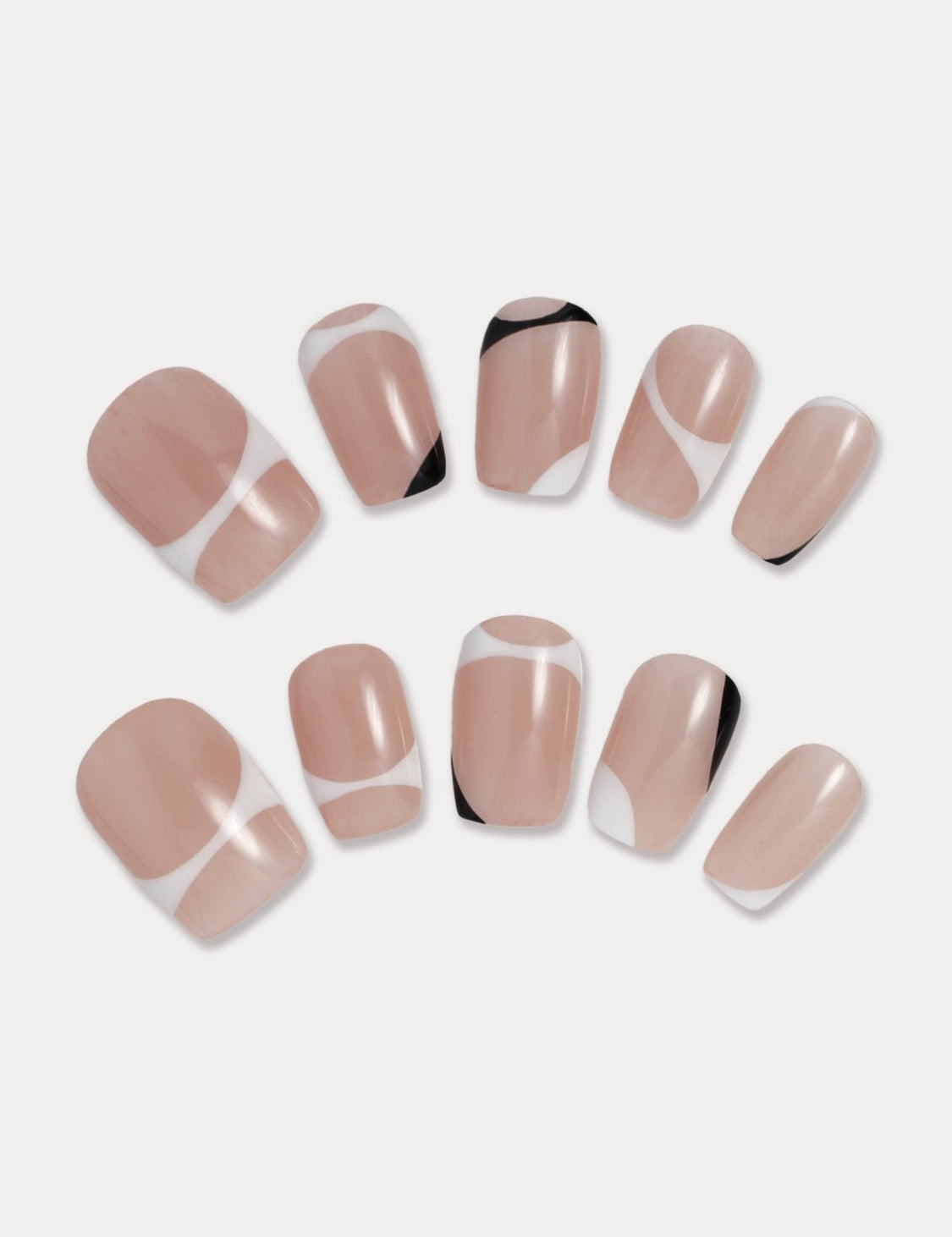 MIEAP Black and White Pattern press on nail set is perfect for the office. Its classic, irregular-shaped design features a black and white pattern overlay on a nude-colored base. The short square shape adds practicality for everyday use. #MIEAP #MIEAPnails #pressonnail #falsenail #nailsart #naildesigns #nailinspo #handmadenail #summernail #nail2023 #classicnail #shortnail #shortsquarenail #nudenail #whitenail #blacknail