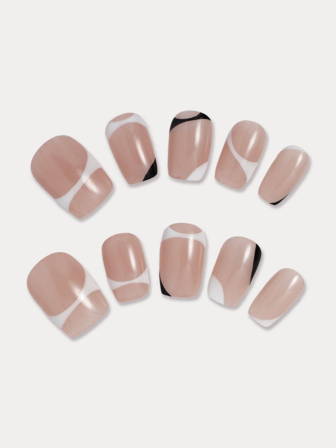 MIEAP Black and White Pattern press on nail set is perfect for the office. Its classic, irregular-shaped design features a black and white pattern overlay on a nude-colored base. The short square shape adds practicality for everyday use. #MIEAP #MIEAPnails #pressonnail #falsenail #nailsart #naildesigns #nailinspo #handmadenail #summernail #nail2023 #classicnail #shortnail #shortsquarenail #nudenail #whitenail #blacknail