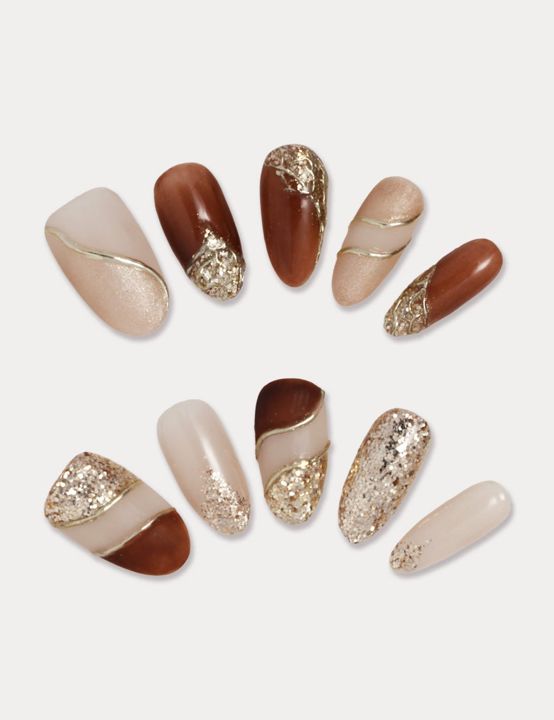 MIEAP Brown Glitter Gold Line press on nail set features 10 different designs for each of your finger. The set offers a combination of matte and glossy top coats, creating a unique AB style on the left and right hands. Indulge in dual nail art experiences with two distinct styles in one nail set. #MIEAP #MIEAPnails #pressonnail #falsenail #acrylicnail #nails #nailart #naildesign #nailinspo #handmadenail #summernail #nail2023 #graduationnail #glitternail #ovalnail #mattenail #datingnail #promnail