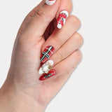 MIEAP Christmas Gift press on nail set is a festive holiday-themed design, features the classic Christmas colors of red and green, and showcases snow-covered rooftops, Christmas trees adorned with gifts and colorful lights, Christmas wreaths with a delicate layer of snow on top. #MIEAP #MIEAPnails #pressonnail #falsenail #acrylicnail #nails #nailart #naildesign #nailinspo #handmadenail #nail2023 #shortnail #rednail #christmasnail